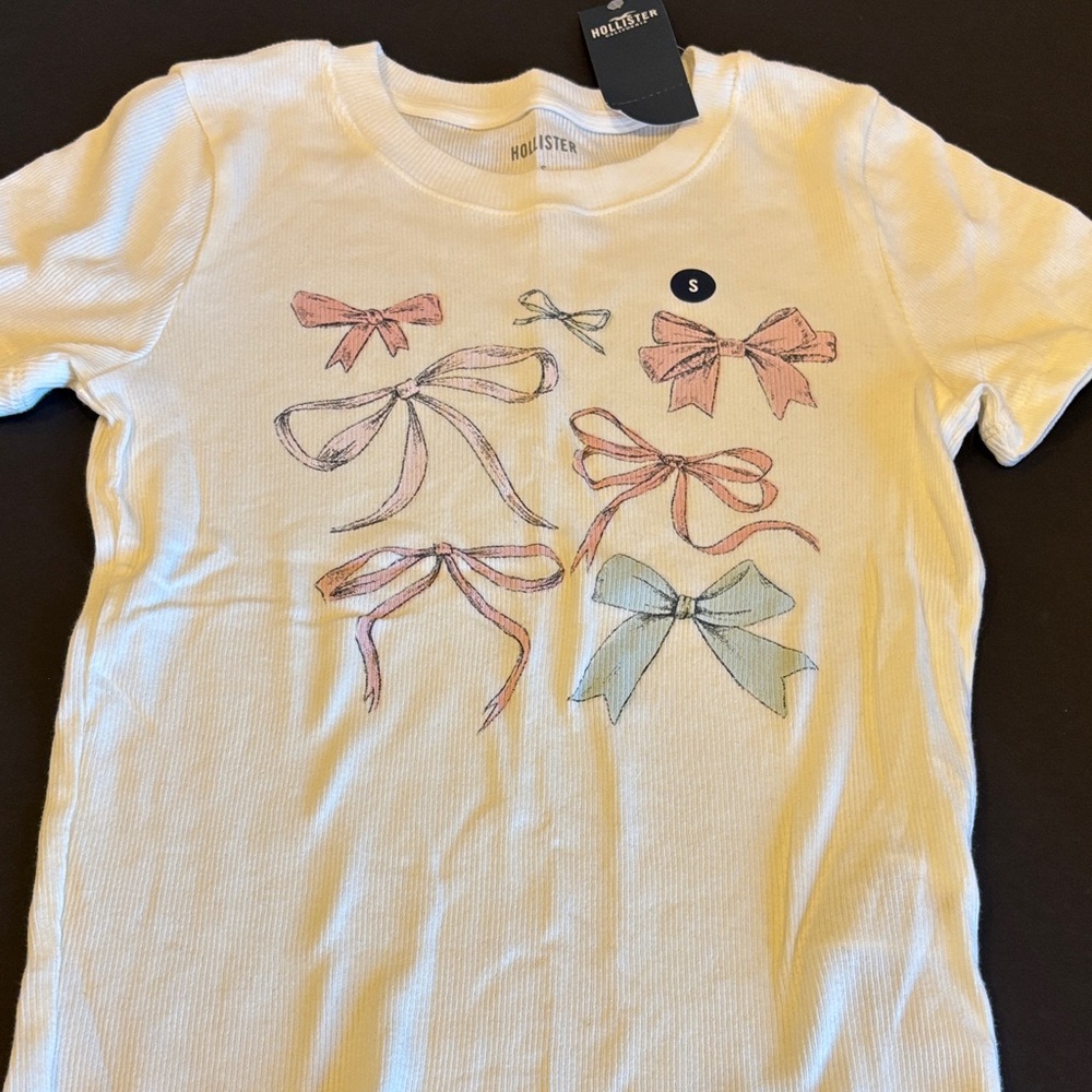 Hollister White Tee with Bow Graphics